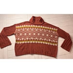 So ladies cropped boxy turtleneck poly sweater w/‎ flare sleeves. Rust, cream XL